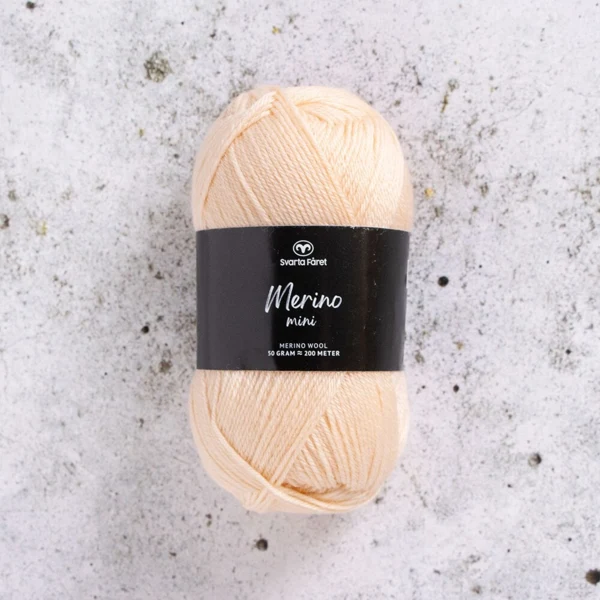 Svarta Fåret Merino Mini 07 Macadamianød
